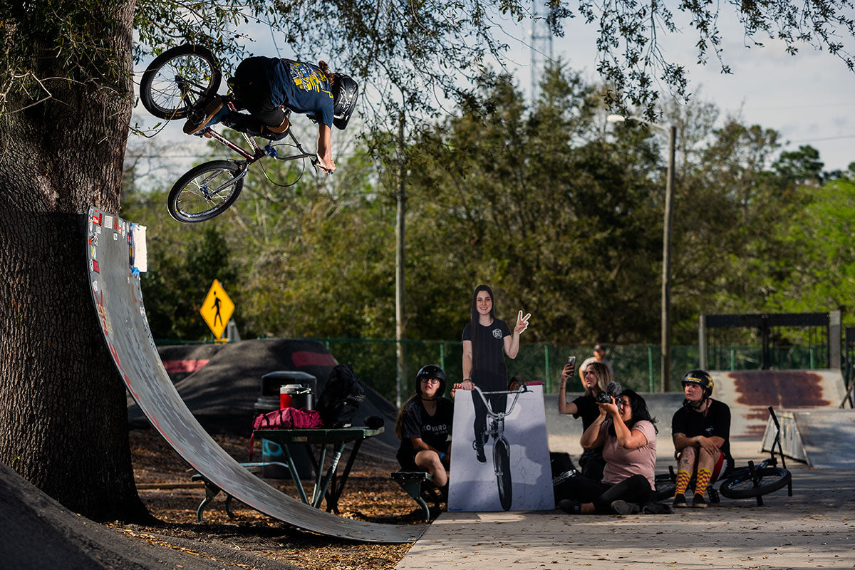Girl on BMX on a BMX ramp